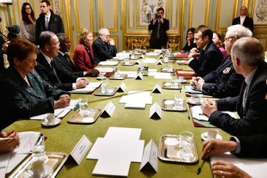 Lors d'une réunion avec Emmanuel Macron en 2017