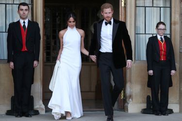 Meghan Markle, dans une robe du soir Stella McCartney, et le prince Harry, le jour de leur mariage, le 19 mai 2018