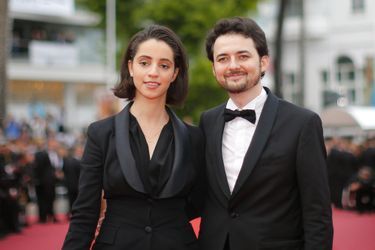 Le réalisateur égyptien Abu Bakr Shawky et la productrice Dina Emam montent les marches du Festival de Cannes, mercredi 9 mai