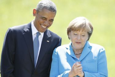 Angela Merkel et Barack Obama dans les jardins du château bavarois d’Elmau, lors du sommet du G7, le 7 juin 2015.