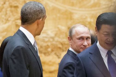 Vladimir Poutine et Barack Obama au sommet de la Coopération économique des pays d'Asie-Pacifique à Pékin (Chine), le 11 novembre 2014.