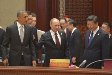 Barack Obama, Vladimir Poutine et Xi Jinping au sommet de la Coopération économique des pays d'Asie-Pacifique à Pékin (Chine), le 11 novembre 2014.