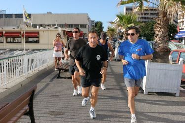 Jogging avec Nicolas Sarkozy , en septembre 2006 à Marseille. 