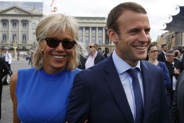 Brigitte et Emmanuel Macron, le 14 juillet 2015, place de la Concorde, à Paris.