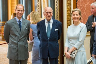 Les princes Philip et Edward et la comtesse Sophie de Wessex à Buckingham Palace à Londres, le 16 mai 2016