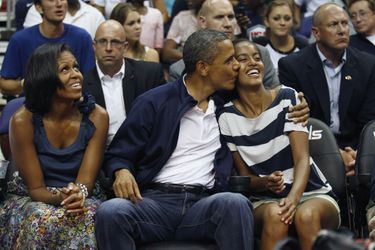 Michelle, Barack et Malia Obama, en juillet 2012.