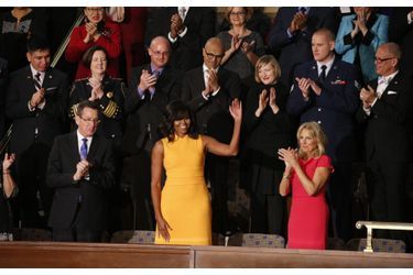 Michelle Obama entourée du gouverneur du Connecticut Dannel Malloy et de Jill Biden