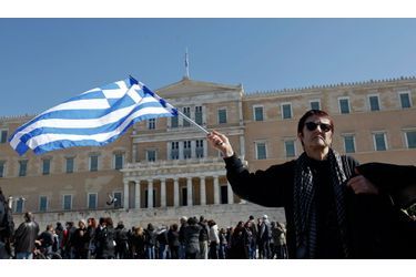 <br />
Février 2012, les Grecs manifestent devant leur parlement contre la politique d'austérité du gouvernement.
