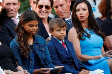Sam et Charlie, les enfants de Tiger Woods, avec sa compagne Erica Herman à la Maison-Blanche, le 6 mai 2019.