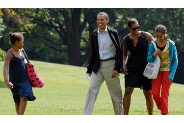 <br />
Barack et Michelle Obama avec leurs filles Sasha (à g.) et Malia.