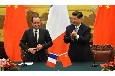 <br />
François Hollande et Xi Jinping.