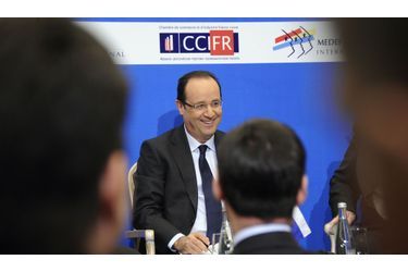<br />
François Hollande lors d'une rencontre avec les milieux d'affaires, jeudi à Moscou.