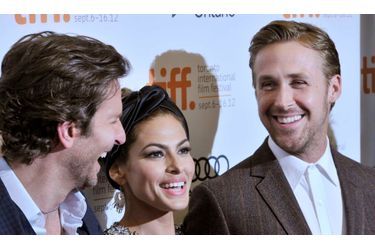 <br />
Bradley Cooper, Eva Mendes et Ryan Gosling à la présentation de "The Place Beyond The Pines" à Toronto en septembre dernier. 