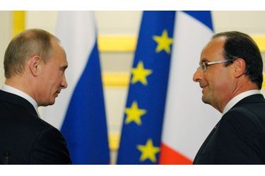 <br />
Vladimir Poutine et François Hollande.