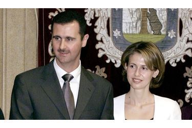 <br />
2001: Le président syrien Bachar El-Assad au côté de son épouse, Asma.