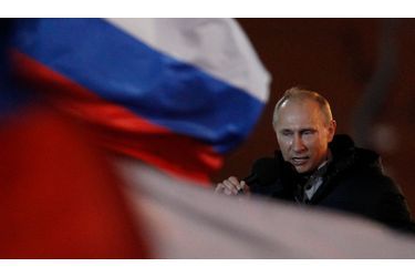 <br />
Vladimir Poutine en larmes après la proclamation de sa victoire.
