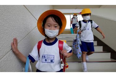 <br />
La vie a repris dans la préfecture de Fukushima. Les masques de protection en plus.