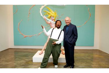 <br />
L’homme d’affaires et l’artiste japonais Takashi Murakami devant le tableau « Cream » (1998) et la sculpture « My Lonesome Cowboy », (1998)