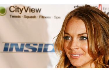 Lindsay Lohan va poser nue