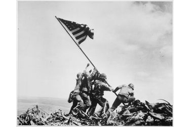 Joe Rosenthal, U.S. Marines of the 28th Regiment, 5th Division, raise the American flag atop Mt. Suribachi, Iwo Jima, on Feb. 23, 1945