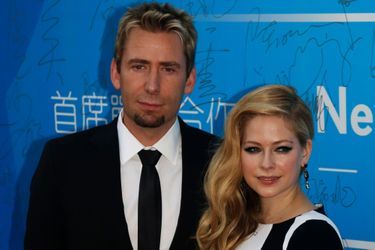 Avril Lavigne et son mari Tchad Kroeger à Macao, le 7 octobre 2013. 