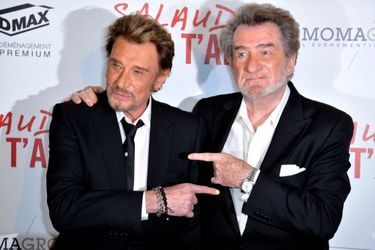 Johnny Hallyday et Eddy Mitchell à la première de "Salaud, on t'aime" à Paris le 31 mars 2014.