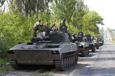 Des militaires des troupes pro-russes dans des véhicules blindés en Ukraine le 13 mai 2022. Image d&#039;illustration.