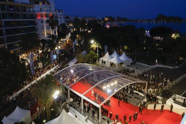 Montée des marches pour le film «R.M.N» au Festival de Cannes, le 21 mai 2022.