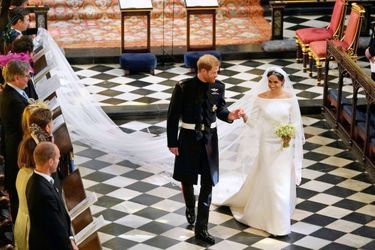 Meghan Markle dans une robe estimée à 265 000 dollars pour son mariage avec le prince Harry, en 2018