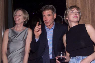 Harrison Ford, son épouse Melissa Mathison et Sharon Stone en soirée à Hollywood.