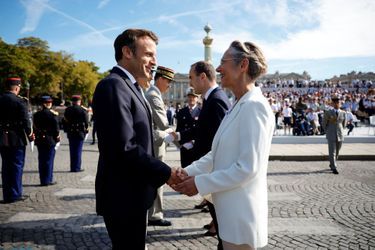 Emmanuel Macron avec Elisabeth Borne lors du défilé du 14-juillet, ce matin sur les Champs-Elysées. 