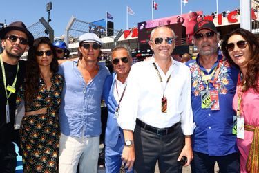 JR, Matthew McConaughey et sa femme Camilla Alves McConaughey, Jean Alesi, Stefano Domenicali, Jean Reno et sa femme Zofia Borucka - Les célébrités lors du Grand Prix de France de Formule 1 (F1) sur le circuit Paul Ricard au Castellet, le 24 juillet 2022.