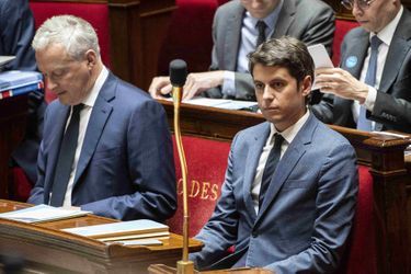 Bruno Le Maire et Gabriel Attal à l'Assemblée Nationale le 22 juillet 2022.
