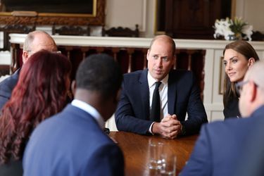 Moment d'échange entre le duc et la duchesse de Cambridge et les bénévoles, à Windsor, le 22 septembre 2022. 