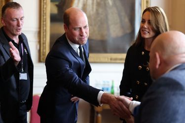Le prince William et son épouse Kate Middleton rencontrent les bénévoles qui ont aidé lors des funérailles de la reine Elizabeth II, à Windsor, le 22 septembre. 
