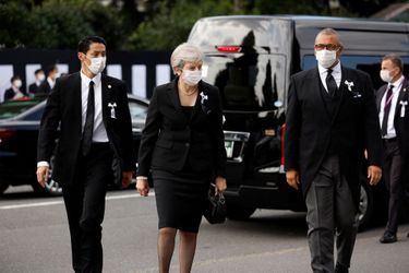 L'ancienne Première ministre Britannique Theresa May arrive aux funérailles de Shinzo Abe.
