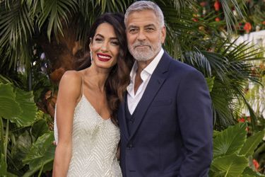 George et Amal Clooney lors de l'avant-première du film "Ticket to Paradise", à Londres, le 7 septembre 2022.