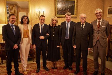 Brigitte Macron surrounded by Stéphane Bern, the Ministers of the Armed Forces and Culture, Xavier Darcos Chancellor of the Institut de France, Frédéric Mitterrand