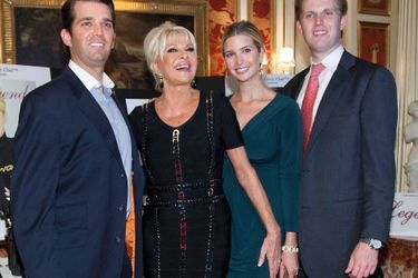 Surrounded by her three children, Donald Jr. (left), Ivanka and Eric, in 2011 in New York.