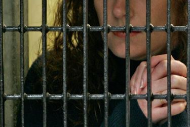 Derrière les barreaux de la prison de Santa Marta, durant son procès, en January 2008.