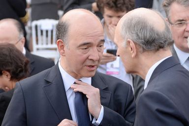 Pierre Moscovici en pleine discussion avec Didier Migaud.