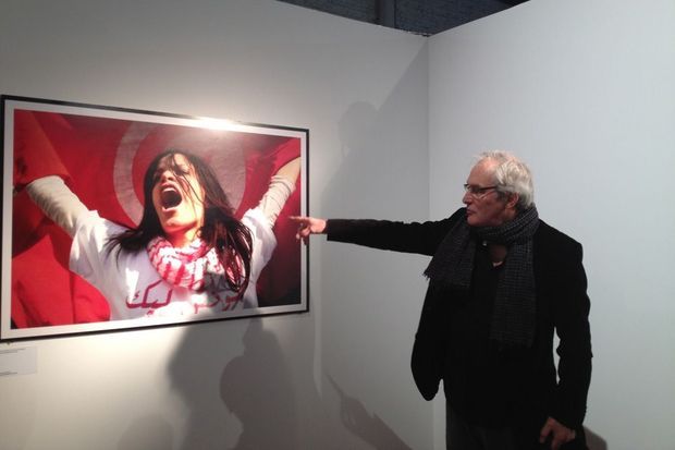 Alain Mingam devant la photo d'Hamideddine Bouali "Pour la laïcité, victoire de Tunisie"