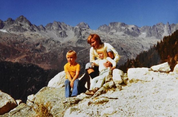 In front of the Aiguilles Rouges, in the north of the French Alps, in 1971. She is 3 years old.  At his side, his brother Pierre and his mother, 
