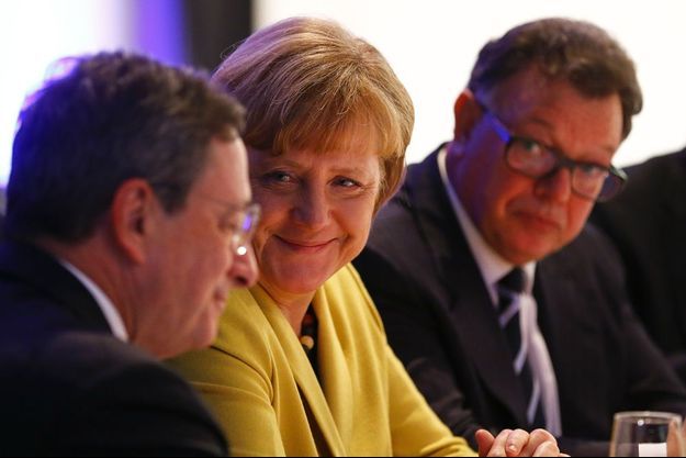 Mario Draghi et Angela Merkel. 