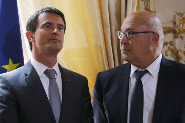 Le Premier ministre Manuel Valls et le ministre des Finances Michel Sapin. 