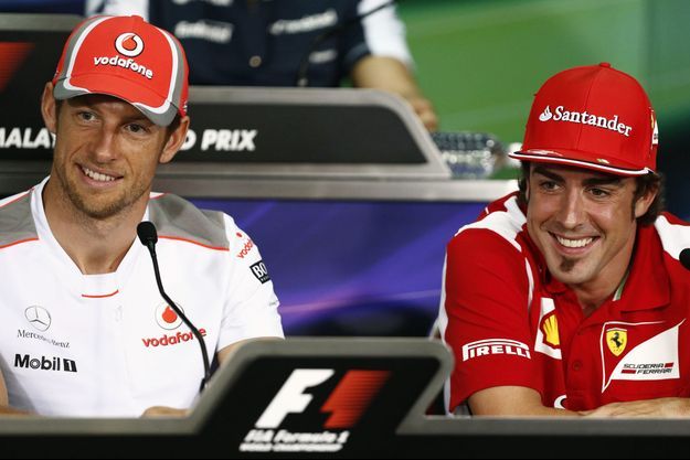 Jenson Button et Fernando Alonso, photographiés en 2012 au Grand Prix de Kuala Lumpur. 