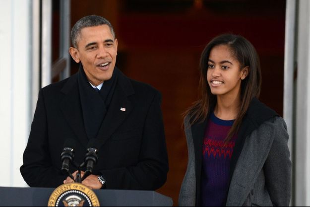 Malia Obama, aux côtés de son père en novembre 2013