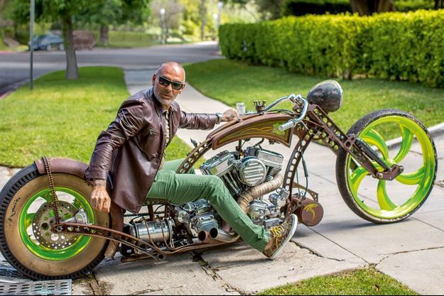 Christian Audigier sur sa moto, une Green Monster TMC, son cadeau d'anniversaire le 21 mai 2014. 