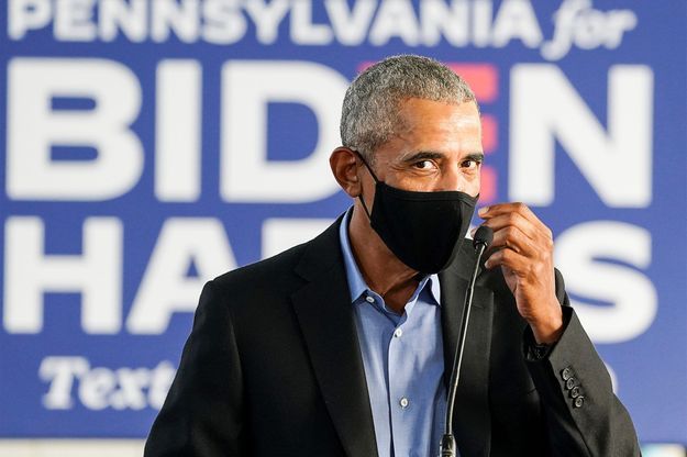 Dans la rue ou en meeting, Obama monte au front pour Biden