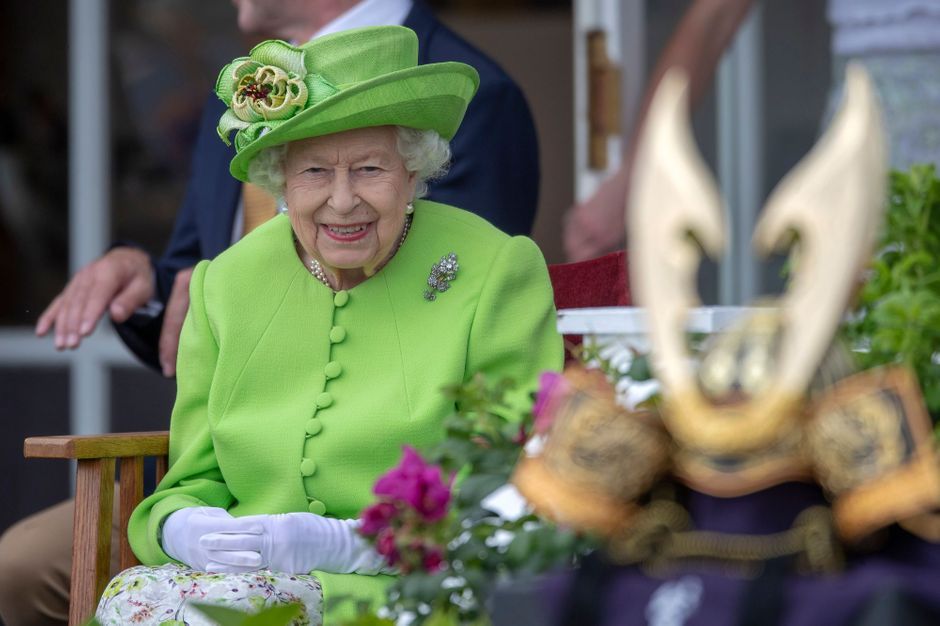 Queen Elizabeth II dressed in pale green for her sports Sunday